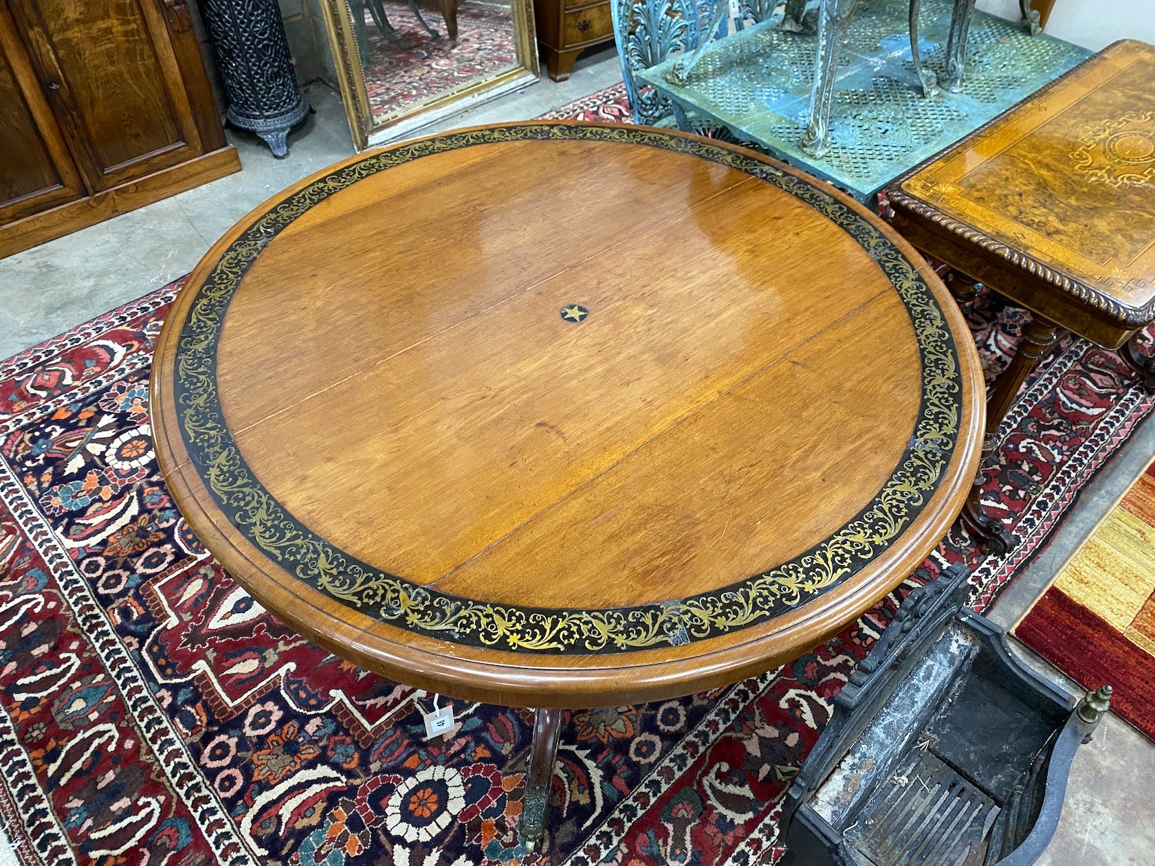 A Regency brass inlaid circular mahogany tilt top breakfast table, diameter 126cm, height 72cm